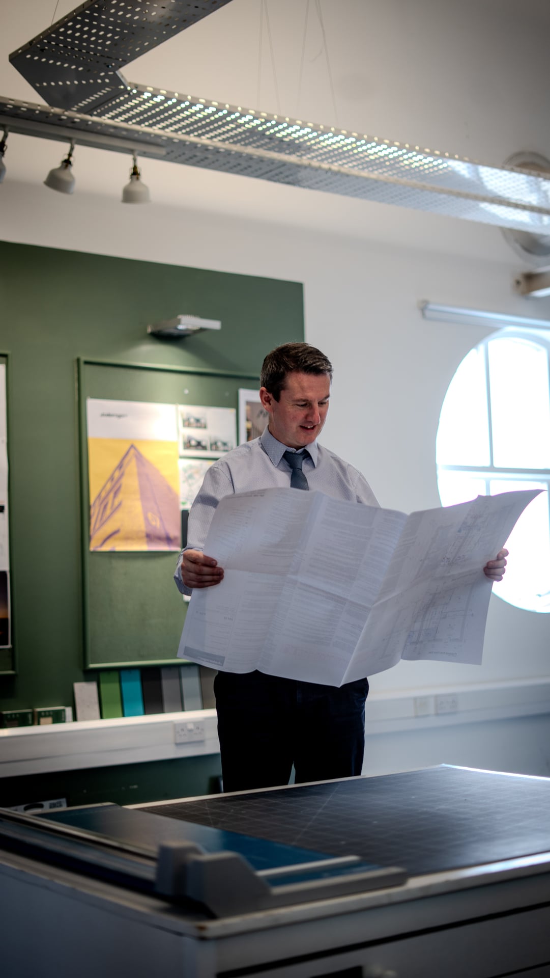 Architect reviewing drawings